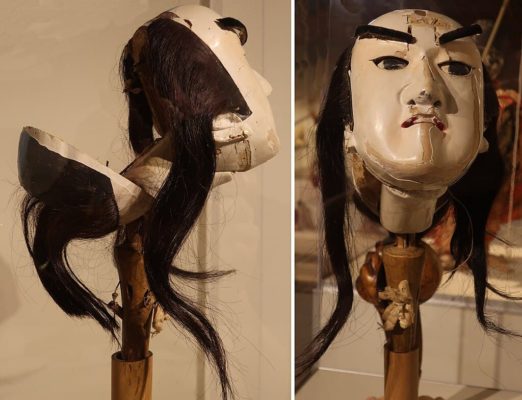 Cabeza masculina de marioneta Bunraku mostrando los controles